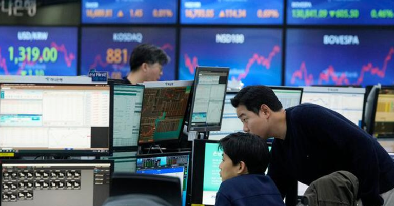 Asian Shares Mixed After Wall Street Gains